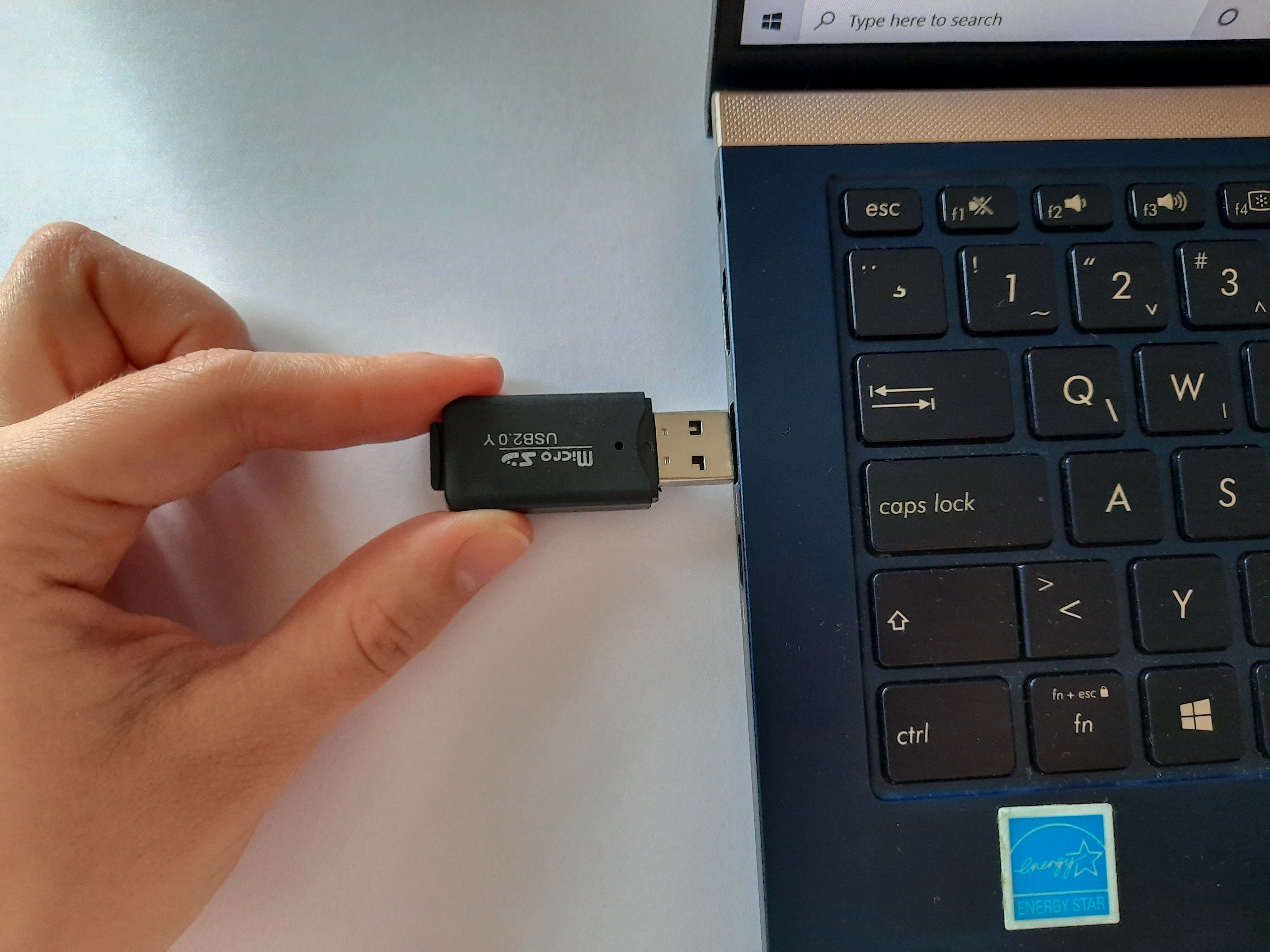 Insert the USB adapter into your computer